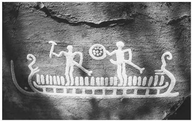 Bronze Age rock art panel from western Sweden, showing boat and two armed figures, one phallic and one not. Vitlycke Museum. 