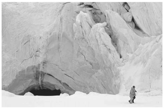 Scientists explore an ice cave on the Larsen ice shelf. 