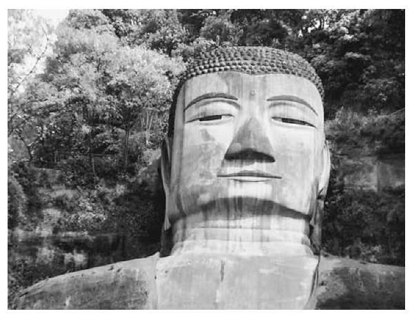 The Le Shan Buddha, built into the mountainside and carved out of rock, near the congruence of the Minji-ang Dadu and Qingyi Rivers, Sichuan, western China, dating from 1312 and said to be the largest stone-carved Buddha image