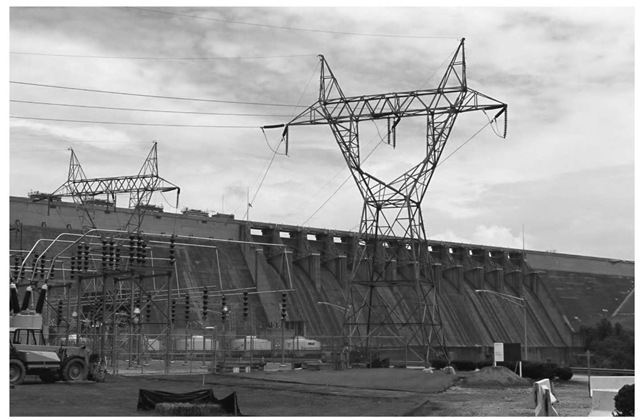 A hyrdoelectric plant in Tennessee. Once the water level reaches a high enough level, a gate is opened in the dam, allowing gravity to carry water down toward the generator. The force of the water falling spins the turbine and generator, creating electricity. 
