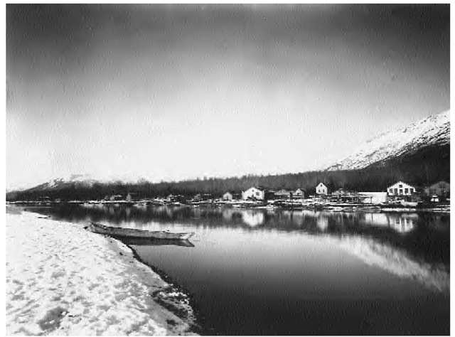 The Tlingit village of Klukwan in 1895. Tlingits usually lived in one main (winter) village and perhaps one or more satellite villages. In the early nineteeenth century the former consisted of a row of rectangular, slightly excavated, gable-roofed planked houses facing the water.