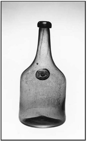 Wine bottle made for Richard Wistar, Wistarburgh Glassworks, near Alloway, c. 1745-1755. Transparent light green glass, applied seal impressed "R.W.,'' h. c. 9 in. 