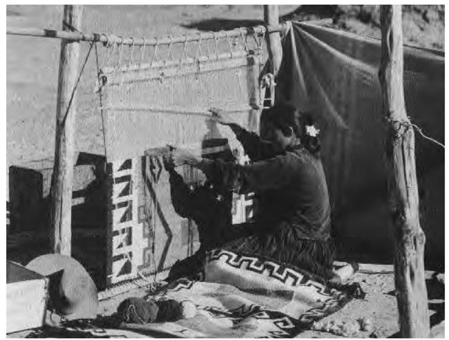 Weaving, done by women, as shown in this 1893 photograph, was learned from Pueblo people around 1700. Navajo weavers created a golden age in the early nineteenth century, and rugs began to replace blankets after 1890.