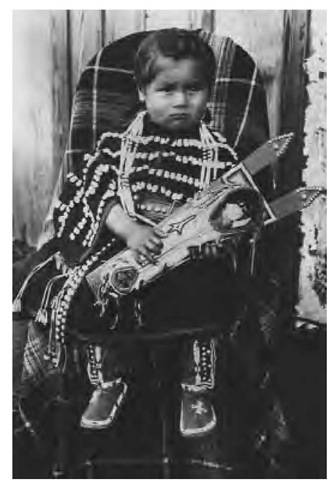 The beadwork in this young Kiowa girl's finery (1921) exemplifies a long-standing Kiowa artistic tradition. 