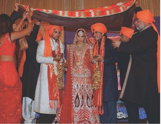 This Indian wedding ceremony will be followed by a lavish feast sure to include a large assortment of sweets. 