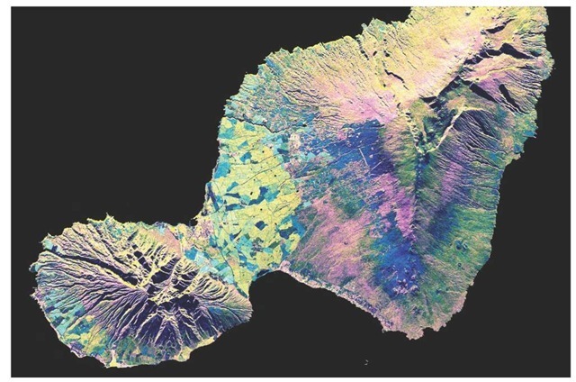 SIR-C image of Maui. This image was acquired by Spaceborne Imaging Radar-C/X-Band Synthetic Aperture Radar (SIR-C/X-SAR) aboard the space shuttle Endeavour on April 16,1994. The image is 73.7 km by 48.7 km (45.7 miles by 30.2 miles) and is centered at 20.8° north latitude, 156.4° west longitude. North is toward the upper left. The colors are assigned to different radar frequencies and polarizations of the radar as follows: Red is L-band, horizontally transmitted and received. Green is C-band, horizontally transmitted and received.25 Blue is the difference of the C-band and L-band channels. 