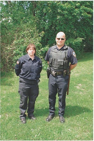 Similarities between law enforcement officer uniforms and EMS uniforms. 