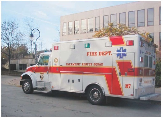 A fire service-based ambulance stands ready for an EMS call.