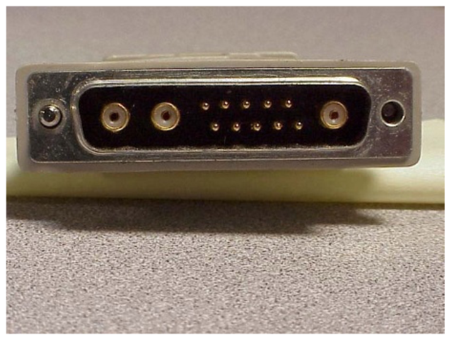 The 13W3 connector. This type, common in the workstation market, also uses a “D”-shaped shell, but has three true coaxial connections for the RGB video signals, in addition to 10 general-purpose pins. Unfortunately, the pin assignments for this connector were never formally standardized. Used by permission of Don Chambers/Total Technologies.